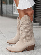 Light beige perforated western ankle boots with low block heel and side pull tabs