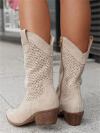 Beige perforated western ankle boots with stacked block heel and side pull tabs