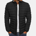 Black quilted puffer jacket with full front zipper and stand collar