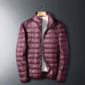 Burgundy waterproof puffer jacket with full-zip front and stand collar.