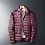 Burgundy waterproof puffer jacket with full-zip front and stand collar.