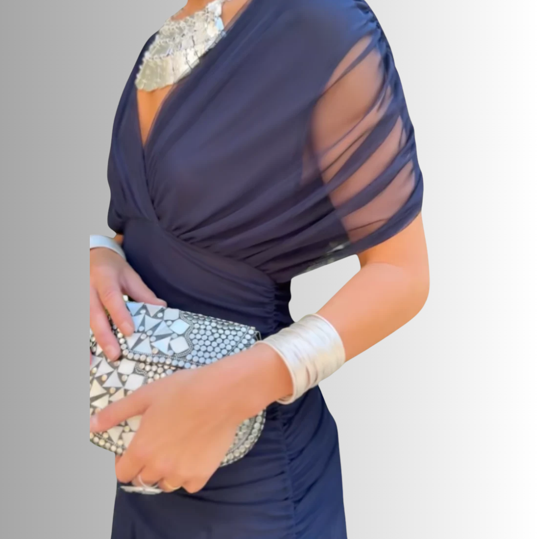 Navy off-shoulder draped midi dress with twisted bodice and pleated skirt