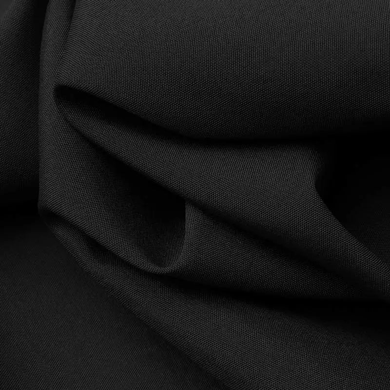 Black woven fabric with soft drape, close-up texture