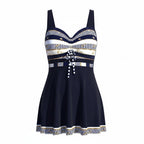 Navy tankini with skirted swim bottom, striped bodice tie-front, scalloped hem