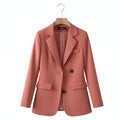 Coral women’s slim-fit blazer with notch lapels and two-button front.
