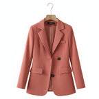 Coral women’s slim-fit blazer with notch lapels and two-button front.