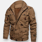 Tan lined jacket with zip front, hood, and utility pockets