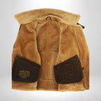 Tan fur-lined interior hood with brown leather patch pockets on flight jacket