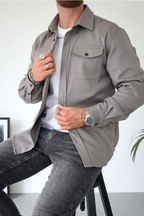 Light gray men’s button-front overshirt with flap chest pockets, long sleeves