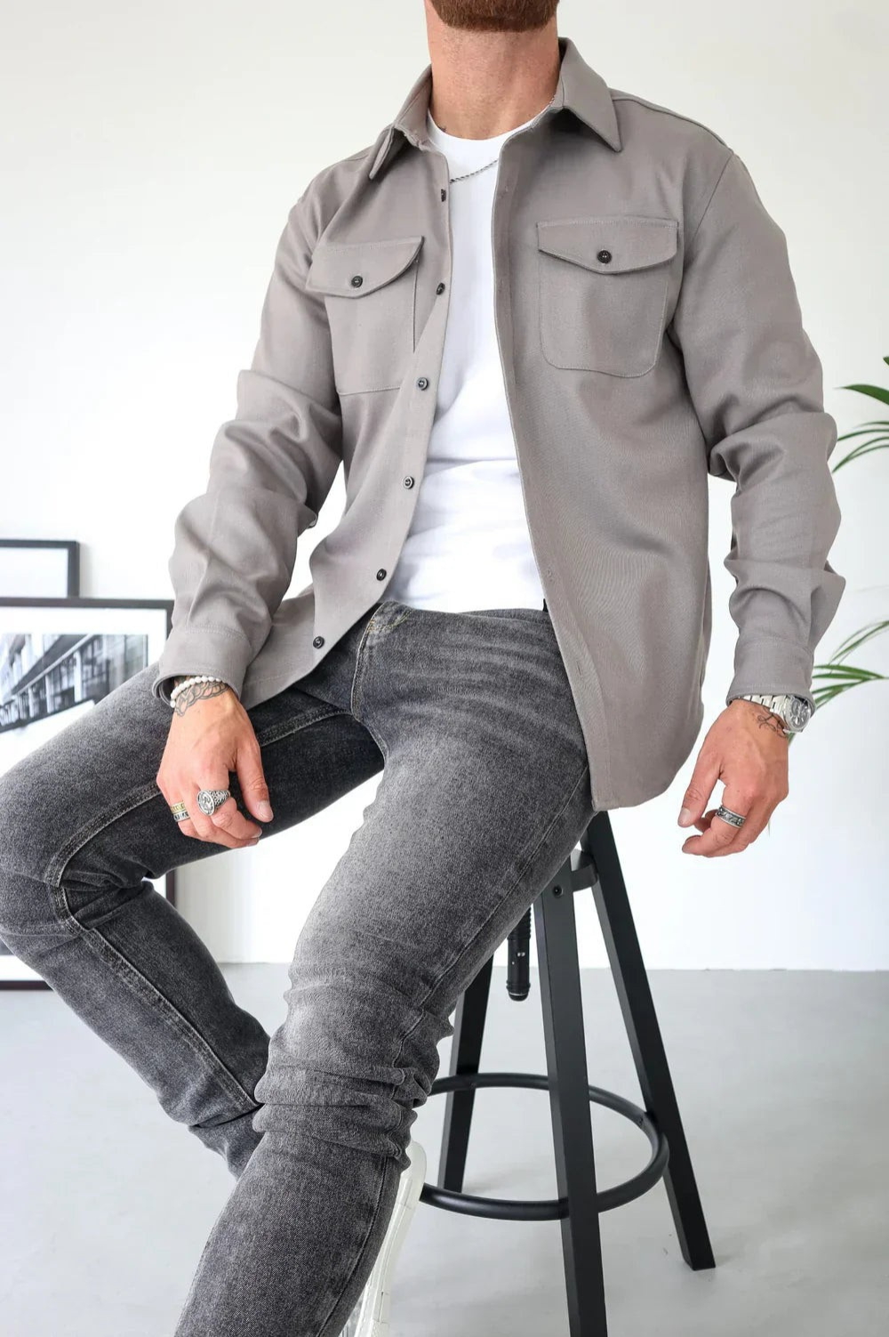 Gray men’s casual overshirt with button front and two flap chest pockets, long sleeves