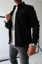 Black men’s button-front overshirt with flap chest pockets and long sleeves