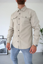 Cream men’s button-front overshirt with flap chest pockets, long sleeves