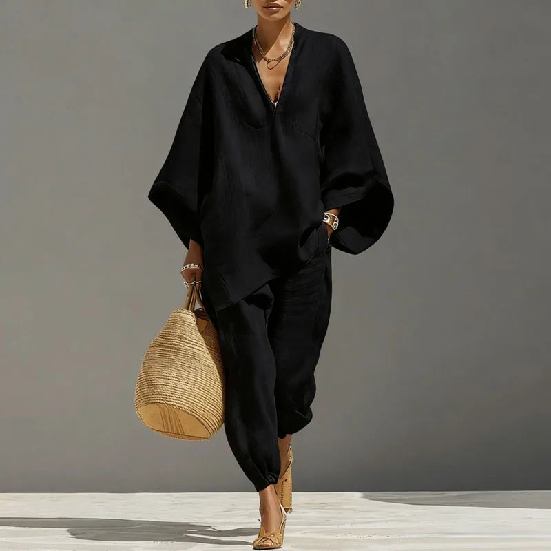 Black batwing tunic blouse with V-neck and matching relaxed joggers two-piece set