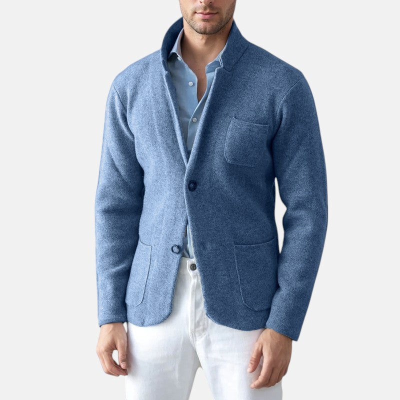 Men's blue blazer jacket with notch lapels, button front, and flap chest pocket