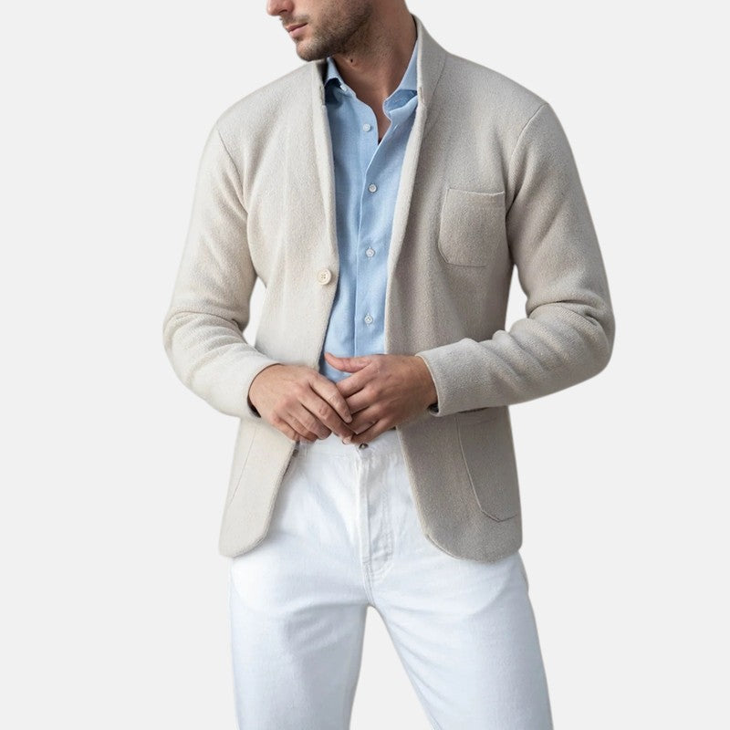 Men's beige blazer jacket with notch lapels, button front, and chest pocket