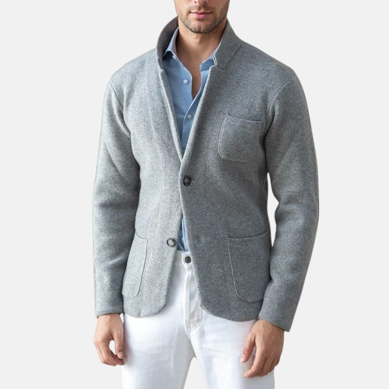 Men's gray blazer jacket with notch lapels, button front, and flap pockets