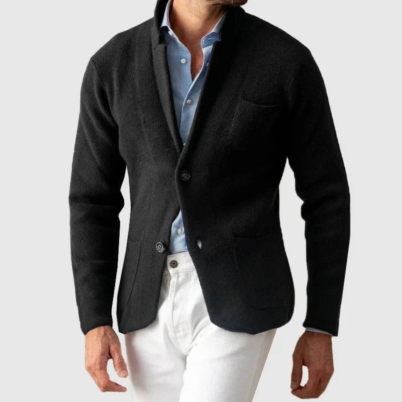 Men's black blazer jacket with notch lapels, button front, and flap pockets