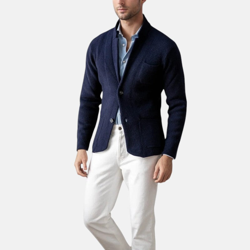 Men's navy blazer jacket with button front and flap pockets, worn open
