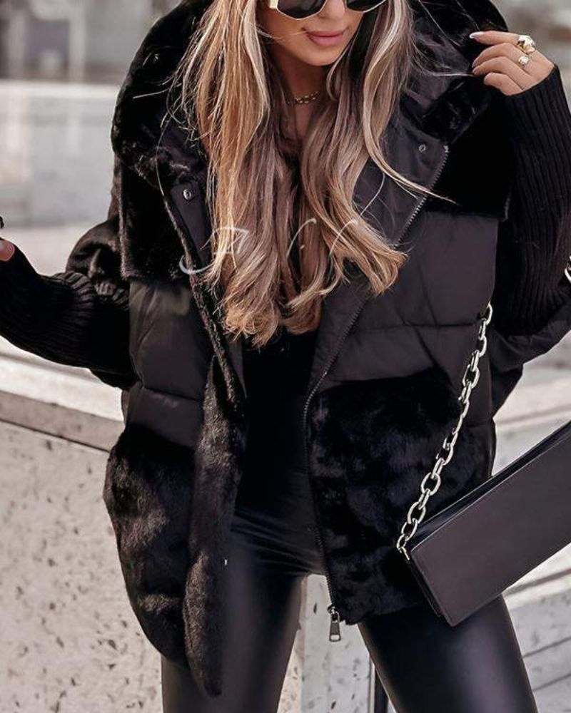 Black hooded puffer coat with faux-fur hood lining, snap front, and ribbed cuffs