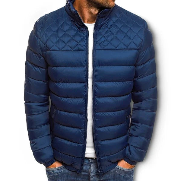 Men's quilted puffer winter jacket in navy with full zip and stand collar.