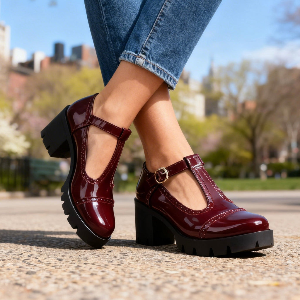 Burgundy Mary Jane t-bar heeled shoes with glossy finish and chunky lug sole