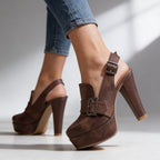 Brown platform heels with loafer front and slingback buckle strap