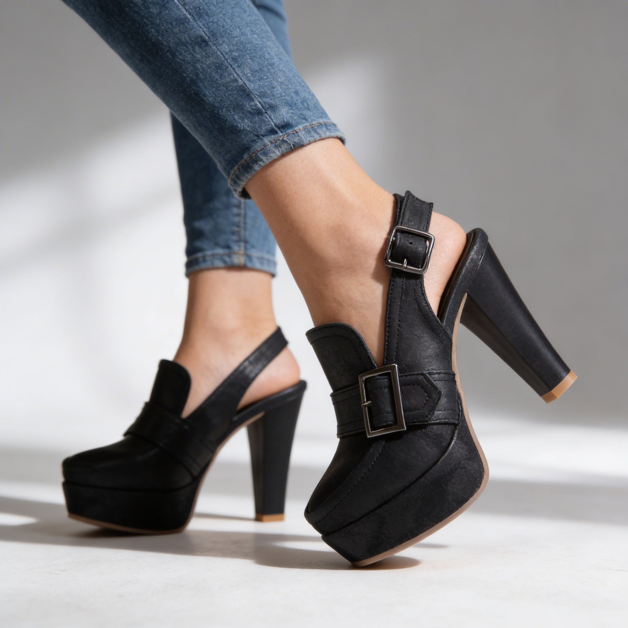 Black suede platform loafer slingback heels with two square buckle straps and block heel