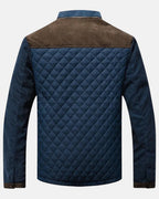 Men's designer jacket back with quilted navy panel, blue sleeves, brown upper yoke