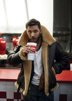 Brown leather jacket with tan shearling collar and lining; front zip closure
