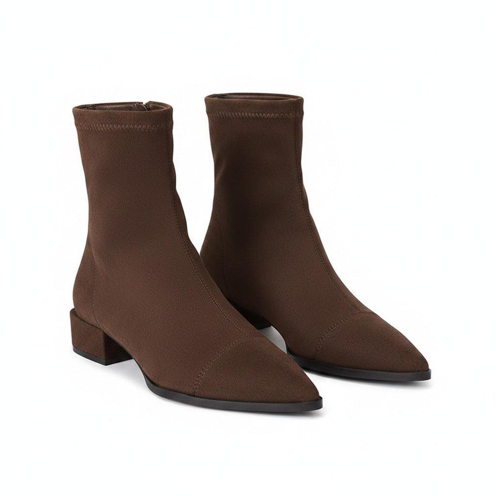 Brown women's pointed-toe ankle boots with block heel and sleek side profile