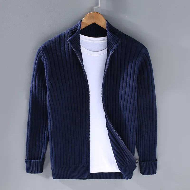 Blue ribbed zip-up cardigan with stand collar, zipper, and long sleeves