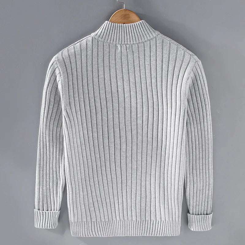 Light gray ribbed zip-up cardigan back with high neck and ribbed cuffs