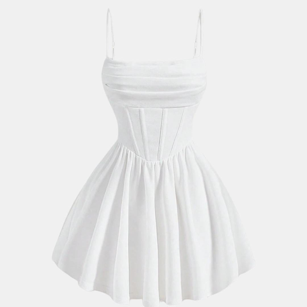 White ruched mini dress with flared skirt and spaghetti straps