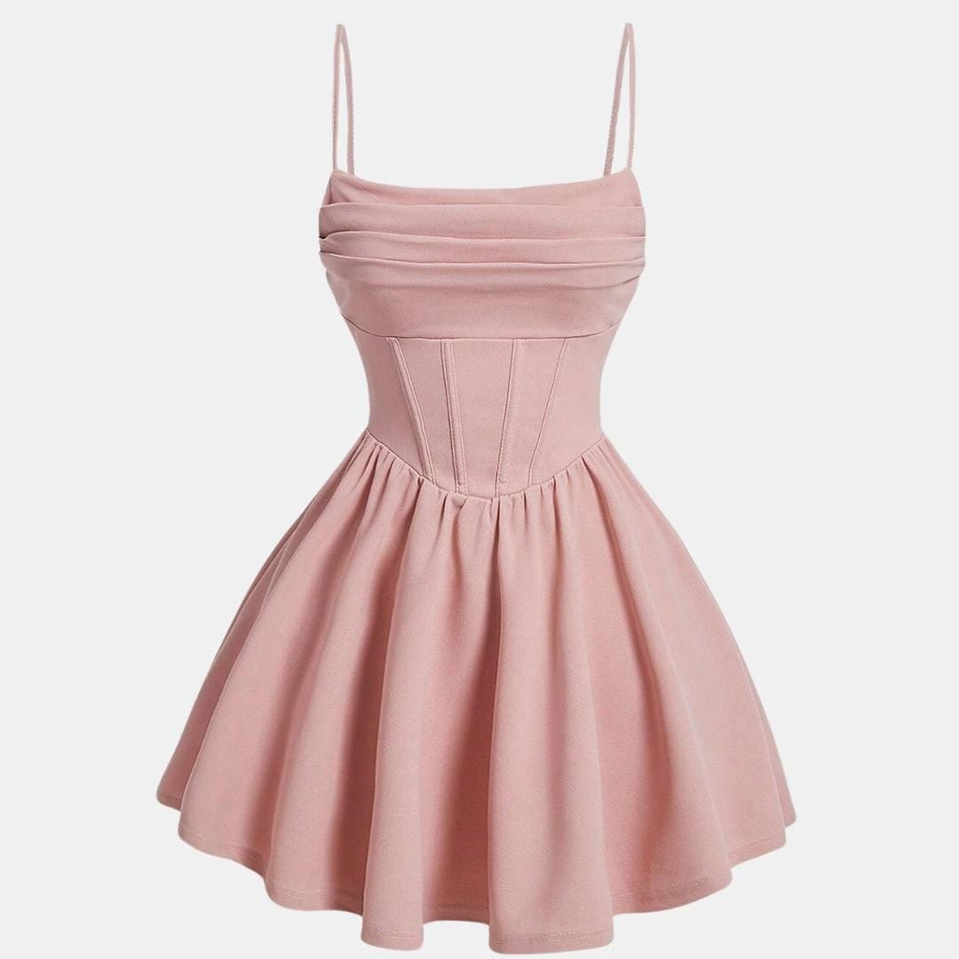 Pink ruched mini dress with flared skirt and spaghetti straps
