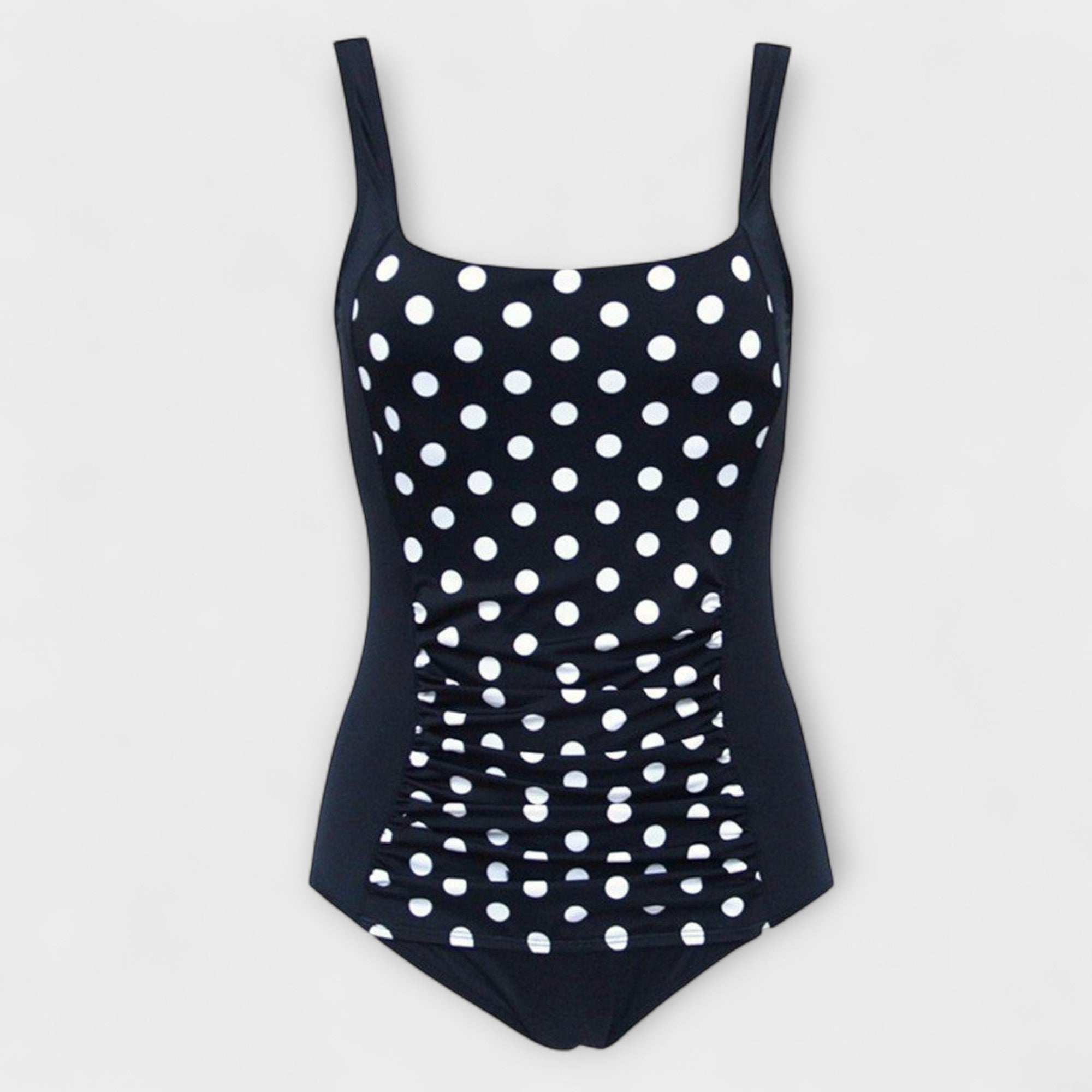 Ruched one-piece swimsuit in black with white polka dots, wide straps