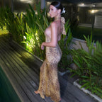 Leopard-print backless sleeveless maxi dress, side view with halter neckline
