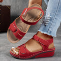 Red slip-on support sandals with two hook-and-loop straps and cushioned insole