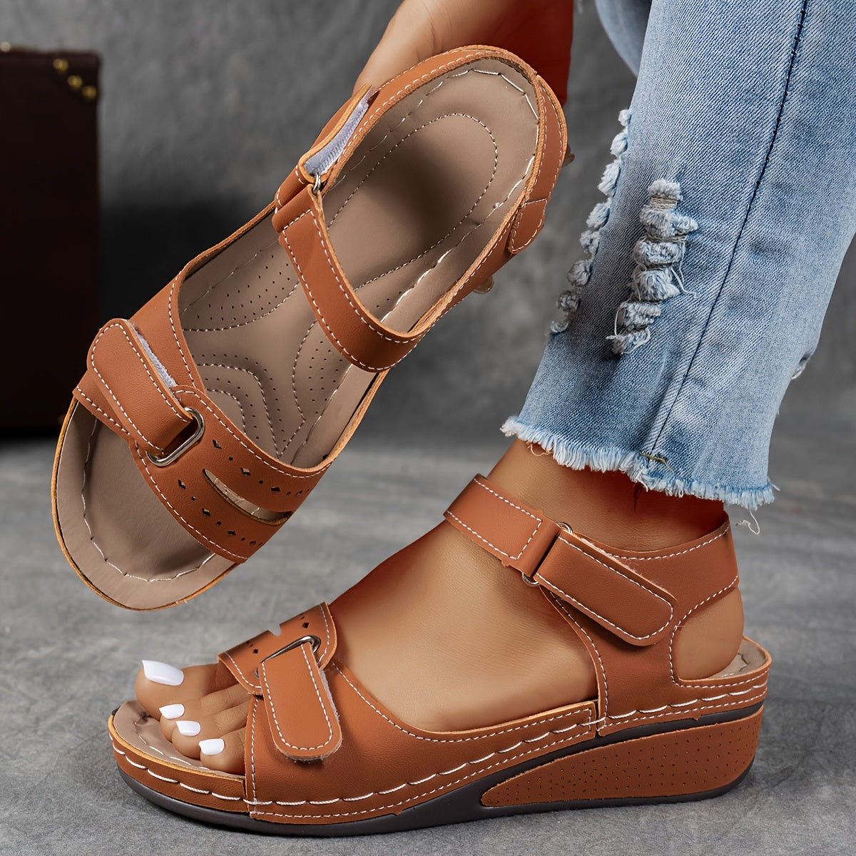 Brown slip-on support sandals with two hook-and-loop straps and cushioned insole