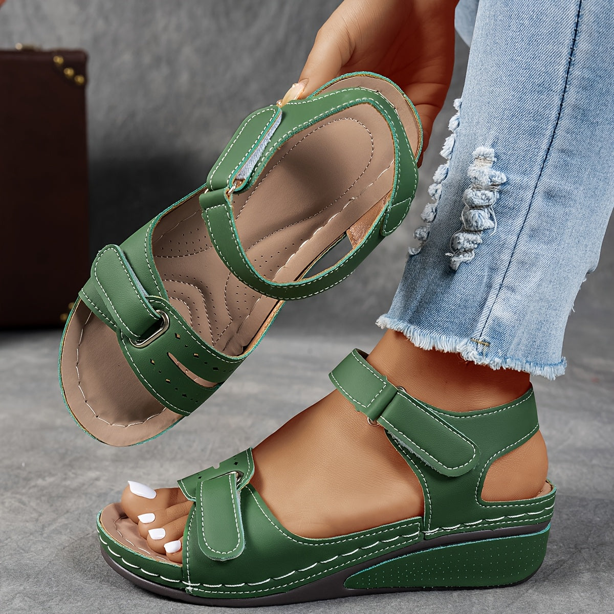 Green slip-on support sandals with two hook-and-loop straps and cushioned footbed