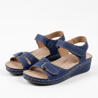Slip-on support sandals in navy with two hook-and-loop straps and cushioned footbed