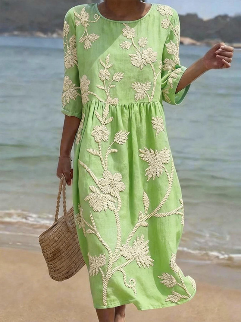 Mint green embroidered midi dress, round neck, 3/4 sleeves, gathered waist, relaxed flowy fit.