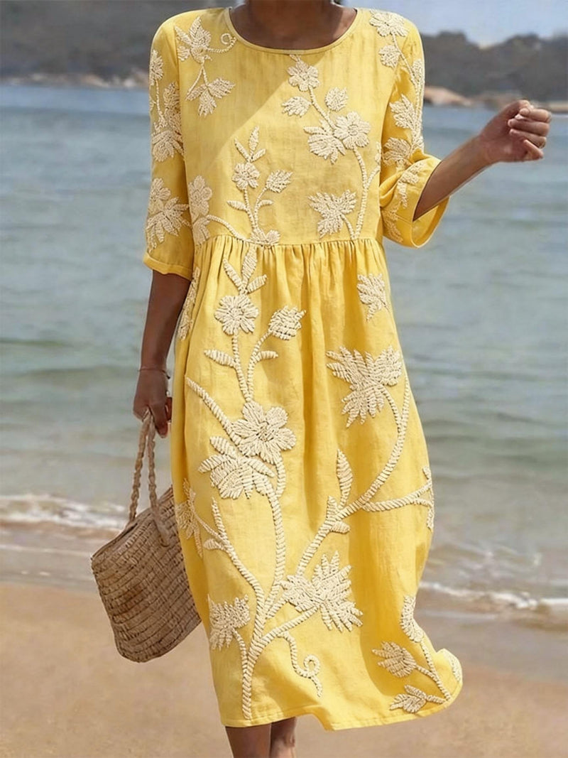 Yellow embroidered midi dress, round neck, 3/4 sleeves, gathered waist, relaxed flowy fit.