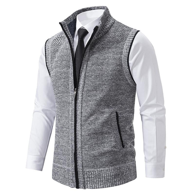 Gray fleece zip-up vest with stand collar and zippered side pockets