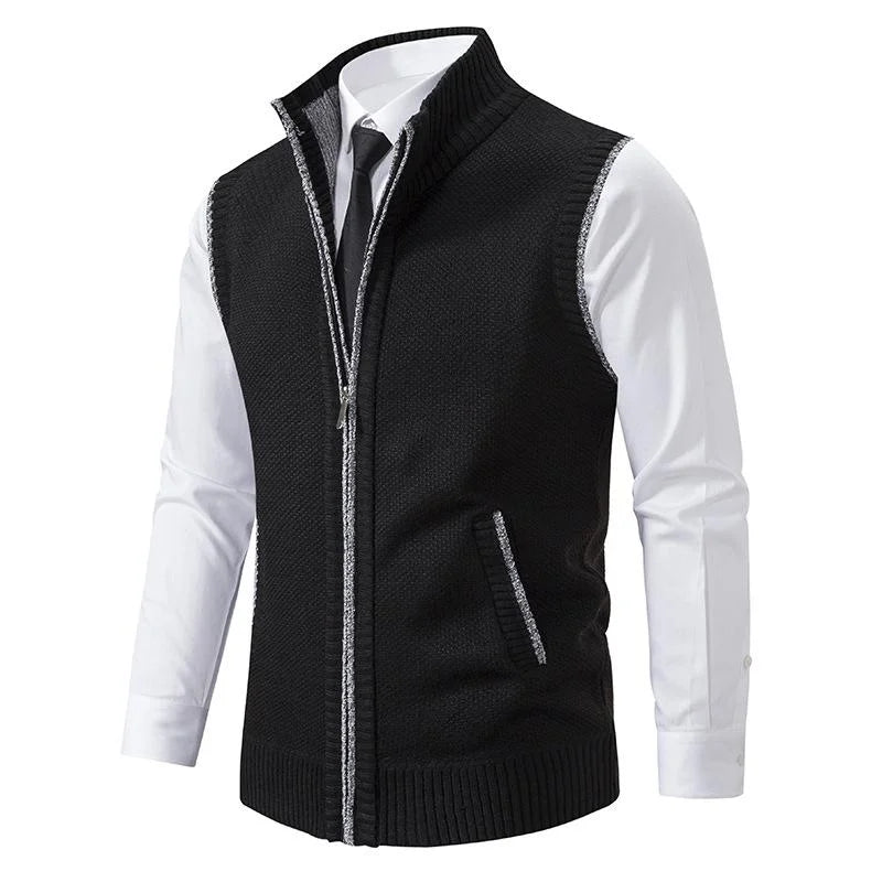 Black fleece zip-up vest with stand collar and side zip pockets