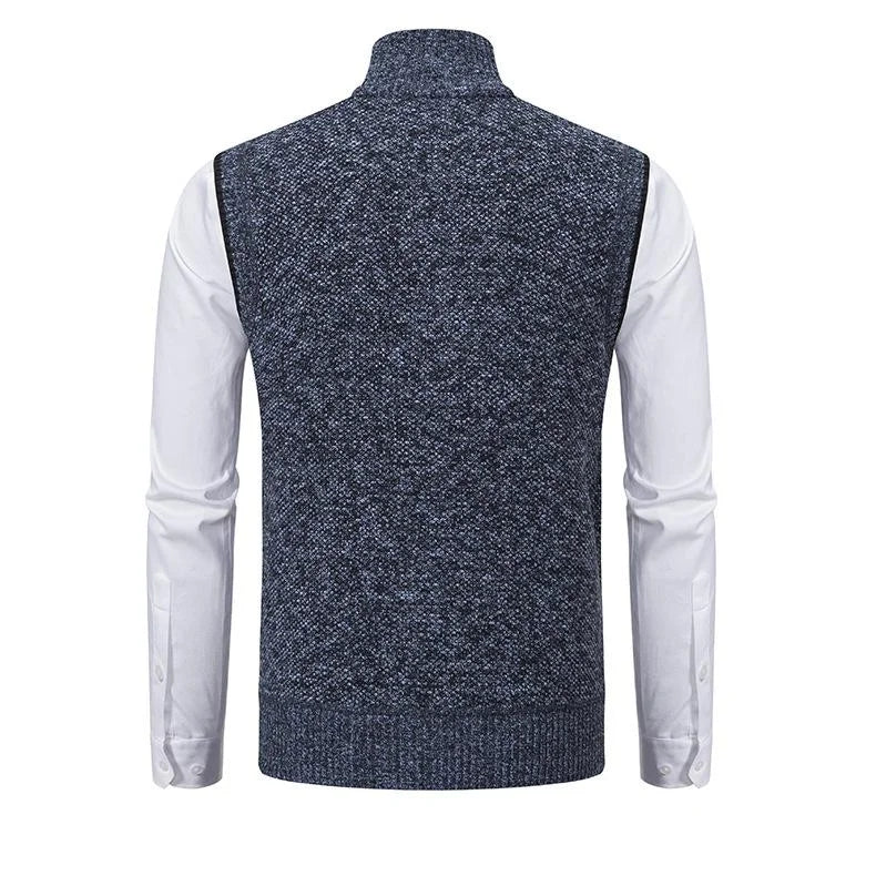 Blue fleece vest back with high collar and ribbed hemline