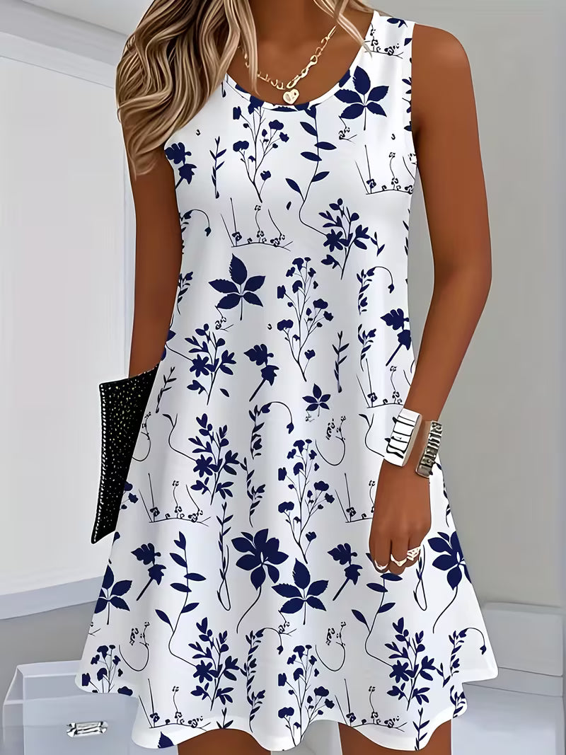Floral sleeveless mini dress, white with navy blue flower and vine pattern