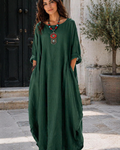 Women's green maxi dress with round neck, loose drape, 3/4 sleeves