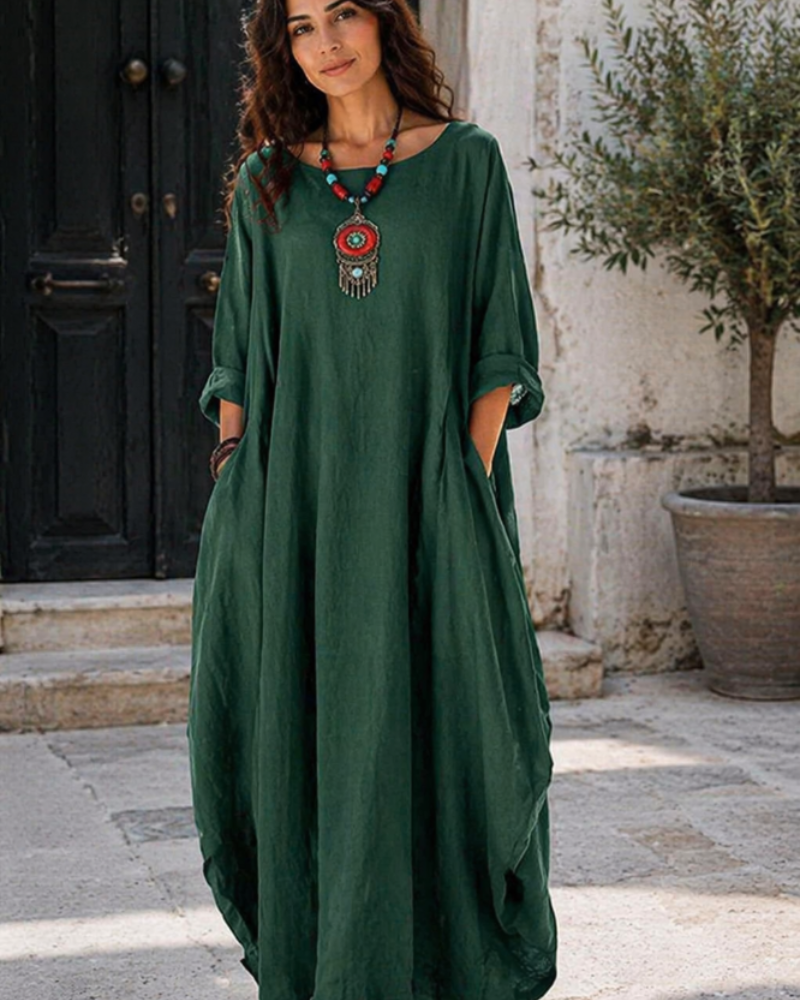 Women's green maxi dress with round neck, loose drape, 3/4 sleeves