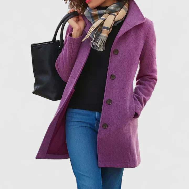 Purple long coat with button front, notched lapels, and side pockets