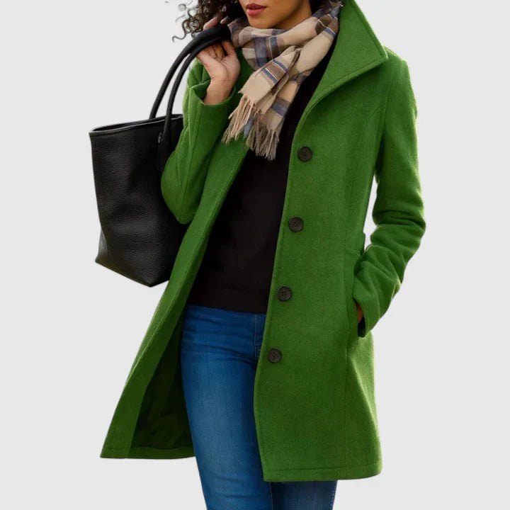 Moss green long coat with button front, notched lapels, and side pockets